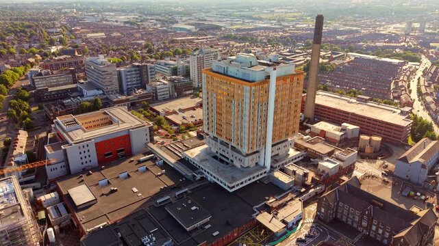 Rising 4K 60FPS aerial GV video of Belfast City Hospital in Belfast, Northern Ireland in the UK. Produced of a summer evening in with Rec709 color.