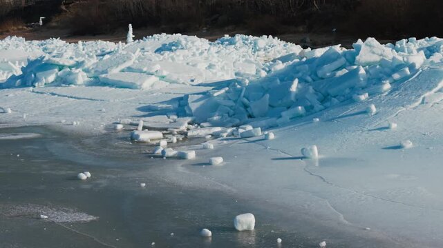 Wind driven Baltic Sea ice forms towering ridges along Tuja Beach, early spring