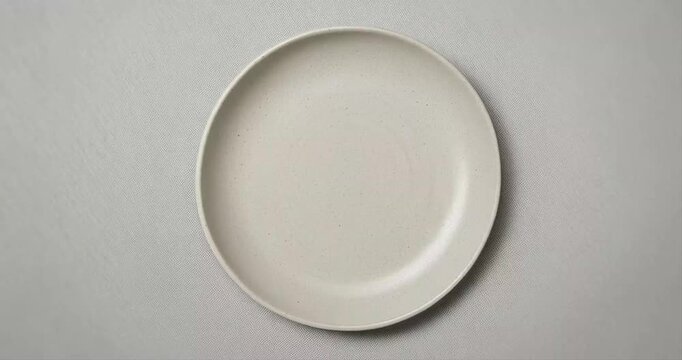 Plain ceramic plate overhead studio shot