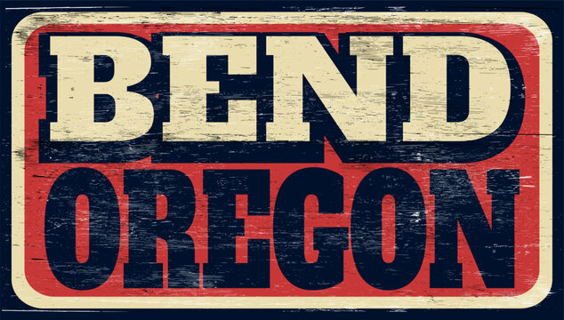 Aged and retro Bend Oregon sign on wood