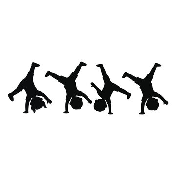 Silhouette of breakdancers performing headspins in a row