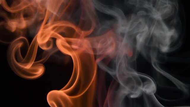 Burnt rust orange and charcoal grey smoke drifts upward in slow motion, intertwining into soft wisps under dramatic backlighting with cinematic atmospheric depth against a dark background.