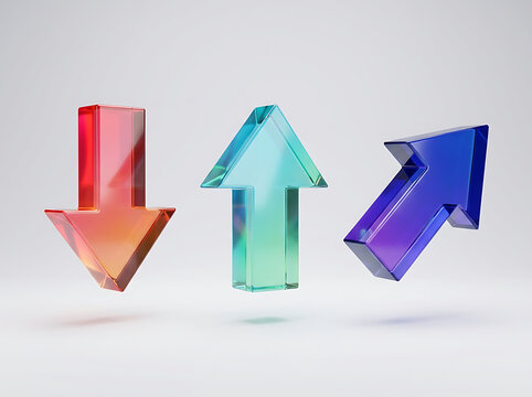 Three colorful translucent glass arrows pointing in different directions isolated on a plain white studio background
