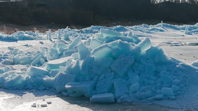 Natural sea ice ridges contrast with hand built ice towers on Tuja Beach, Latvia