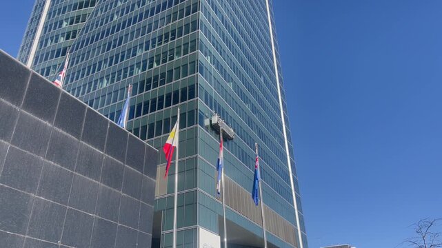 Flags outside the embassies of Australia, Canada, the UK and the Netherlands in Madrid