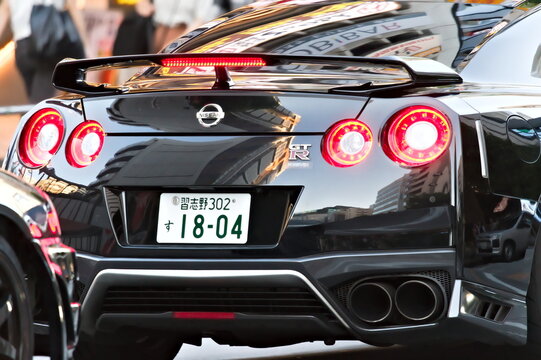 Powerful Nissan GTR stuck in traffic in the streets of Tokyo, Japan