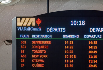 Obraz premium Montreal, Quebec, Canada. July 27, 2026. Close up shot of VIA Rail Canada digital departure board showing train schedules.