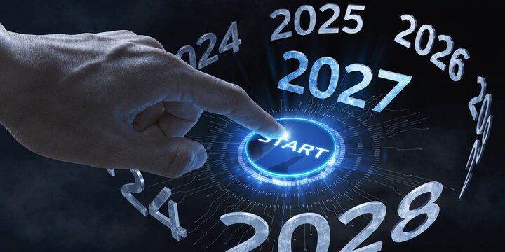 Human finger pushing digital start button for new year future goals
