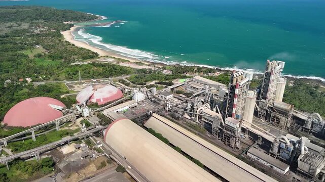 Expansive cement factory captured by drone, symbolizing industrial power, construction materials, and economic activity.