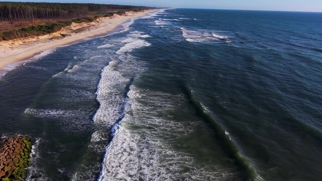 Aerial - Waves breaking along Sao Pedro de Maceda beach near Ovar