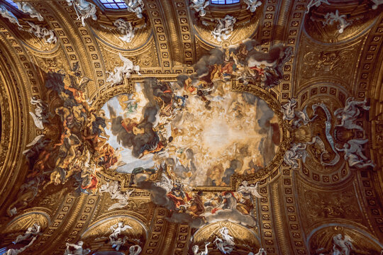 Baroque Church of the Most Holy Name of Jesus interior in Rome with ornate ceiling frescoes, Italy