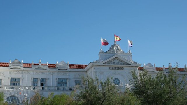Santander, Cantabria, Spain. June 12, 2026. Elegant White Casino Building Under a Deep Blue Sky. Seaside Resort Lifestyle and Atmosphere. Quiet Luxury. Copy Space.