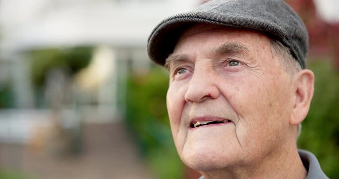 Thinking, old man and daydream with smile, outdoor and contemplating on break and thoughts at house. Retirement home, choice and senior person with nostalgia, remember or happy with memory on weekend