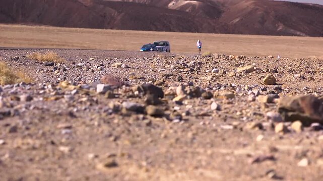 Athlete running marathon in death valley with one leg