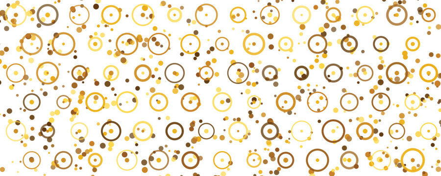 Abstract gold circles scattering on white background with bokeh effect for festive celebration concepts