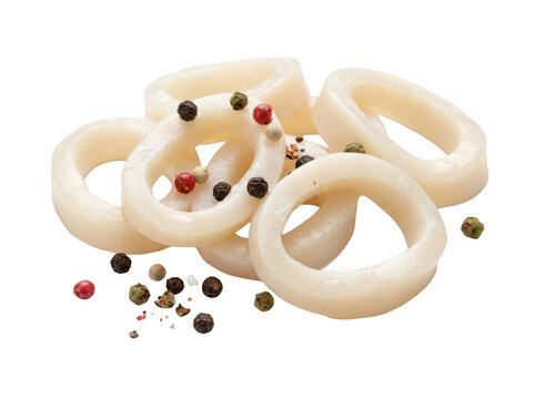 Raw squid rings with peppercorns. Fresh calamari pieces isolated on white background.