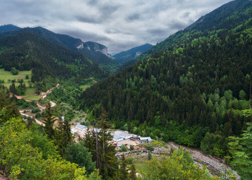Construction site on the riverbank in the valley