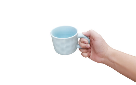 A white ceramic coffee mug is empty in a man's hand PNG transparent.