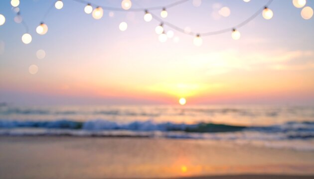 Summer sunset blurred beach background with festive garland bokeh lights for widescreen banner