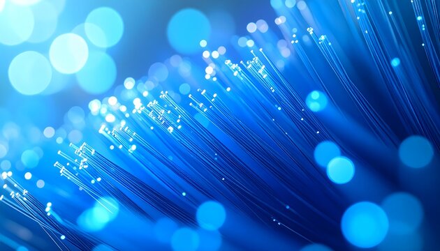 Fibras &oacute;pticas azules luminosas en primer plano con puntos de luz y efecto bokeh sobre fondo tecnol&oacute;gico