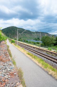 Railroad of regional train, Moselle valley in Winningen, Germany, railway tracks, modern public transportation, infrastructure in Europe