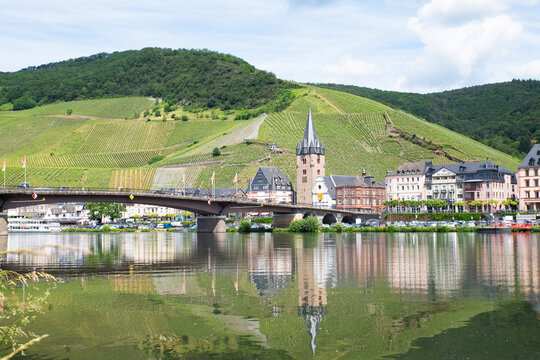 Bernkastel Kues village, Moselle Valley, cityscape with bridge, church, vineyards and mosel river landscape, Riesling wine growing region, Germany