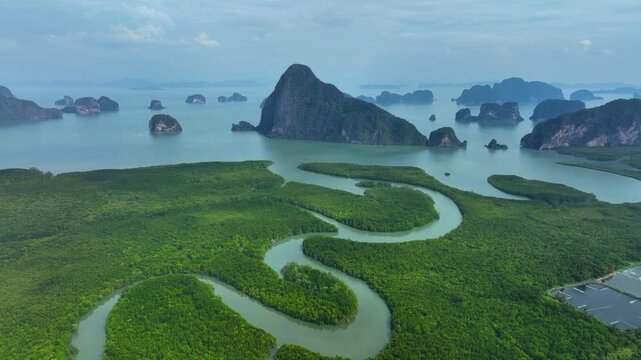 Aerial view of Samet Nangshe Viewpoint overlooking lush mangrove forests and limestone karsts in the bay, Tambon Khlong Khian, Chang Wat Phang-nga, Thailand.