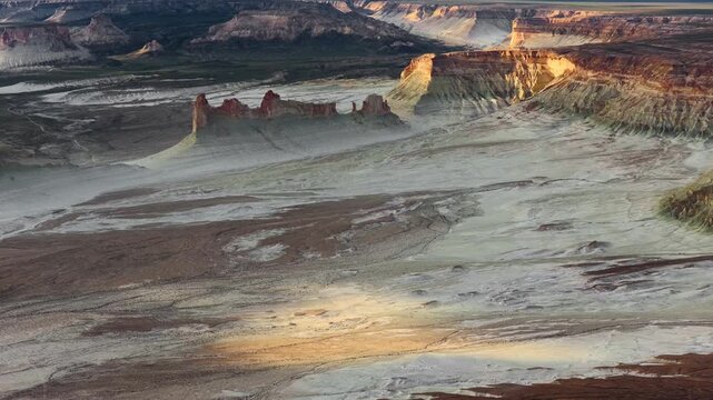 Aerial view of the dramatic Bozjyra rock formations and vast desert landscape in Aktau, Mangystau Region, Kazakhstan.