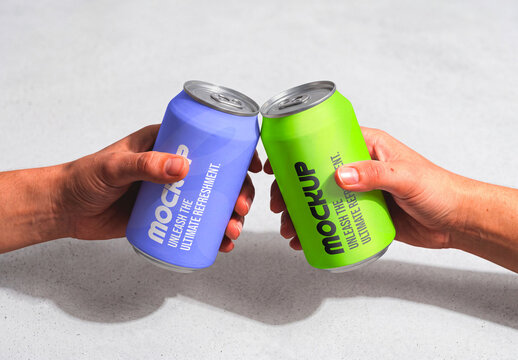 Two Soda Can Mockup Held in Hands for Beverage Branding