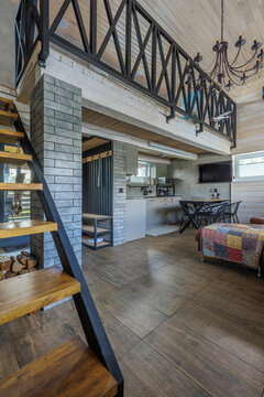 Open Plan Interior View of Modern Country House with Mezzanine