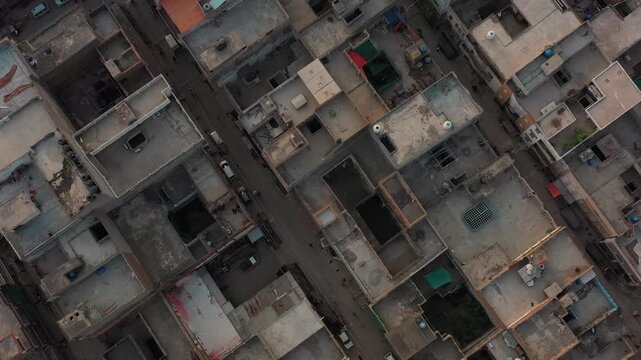 Direct Overhead Drone View Showcasing Dense City Architecture and Residential Housing Blocks