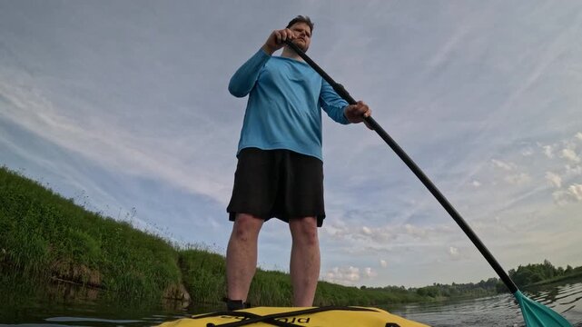Man paddling SUP on Miedzybrodzkie Lake