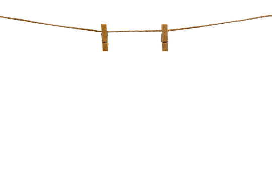 Wooden clothespin on a rope isolated on a transparent PNG background. Realistic hanging clip with clothesline for mockups, decorations, and creative designs.