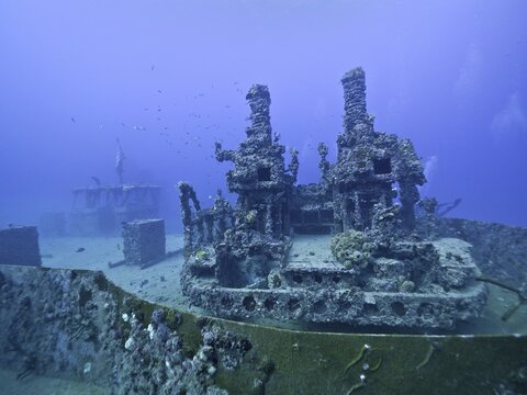 A complex underwater structure reclaimed by nature with visible coral growth: Wreck of the USS Spiegel Grove, dive site John Pennekamp Coral Reef State Park, Key Largo, Florida Keys, Florida, USA