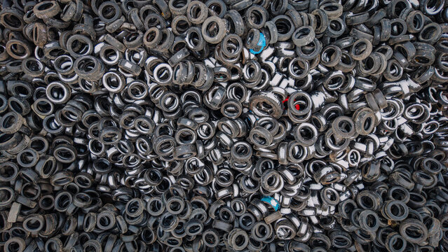 Aerial view of a massive pile of used car tires at a recycling facility, highlighting environmental pollution and rubber recycling Valmiera, Valmiera, Latvija.
