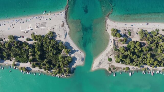 Turquoise Lagoon Channel Framed by Sandy Beaches and Trees