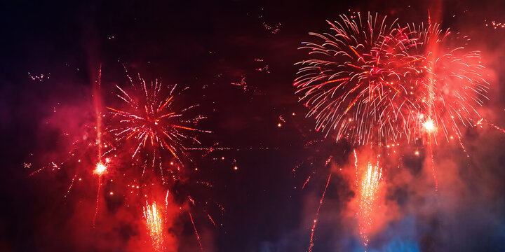Silvester festival 2027 New year New Year's Eve Party, new years eve background banner panorama long- red firework fireworks pyrotechnics on dark night sky texture