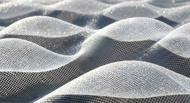 Abstract background featuring repeating patterns of soft rounded mounds creating a rhythmic landscape of light and deep shadows