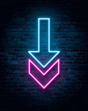 Abstract neon glowing double downward arrow design on dark brick surface with direction background electric