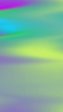 Abstract background with soft blurred gradients of green blue and purple colors.