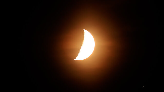 Half Moon on a dark night sky.