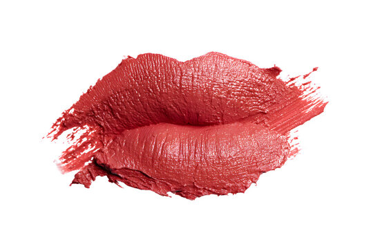 Red lipstick smear in lip shape, textured cosmetic product stroke, creamy makeup swatch isolated on white background