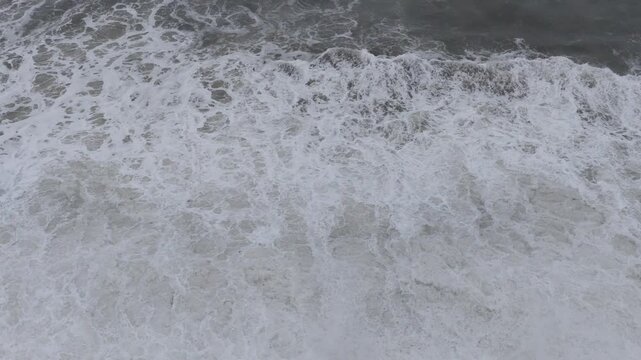 Violent sea waves crash against waterfront road as typhoon approaches coastal metropolis
Stormy ocean and towering surf along city shoreline, natural disaster typhoon scene
