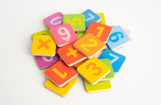 Number wood block cubes for learning Mathematic, education math concept.