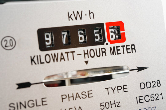 Electric measuring power meter for energy cost at home and office.