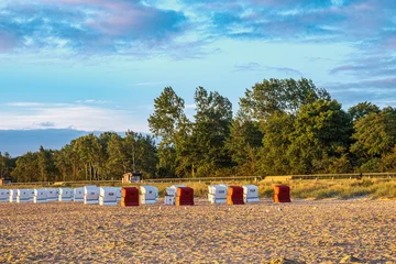 Beach chairs on the deserted Baltic Sea beach near Boltenhagen in the morning © fotografci