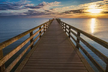 Sunrise over the pier on the Baltic Sea near Boltenhagen © fotografci