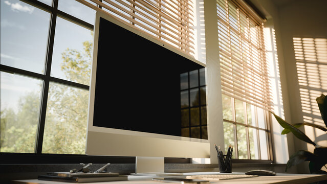 Computer Blank Screen Mockup in Sunlit Minimalist Home Office
