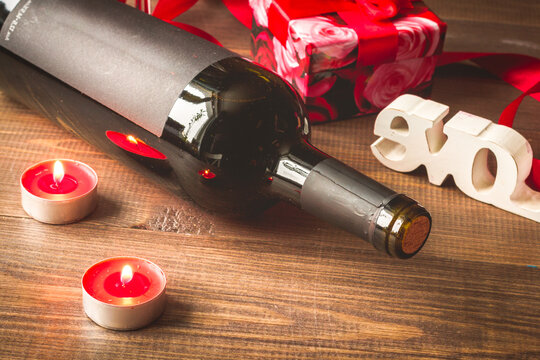 concept Valentine Day with wine at wooden background