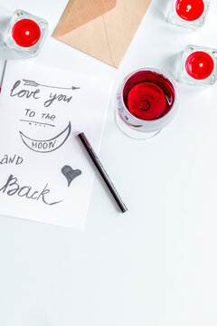 concept of Valentine Day love letter white background top view